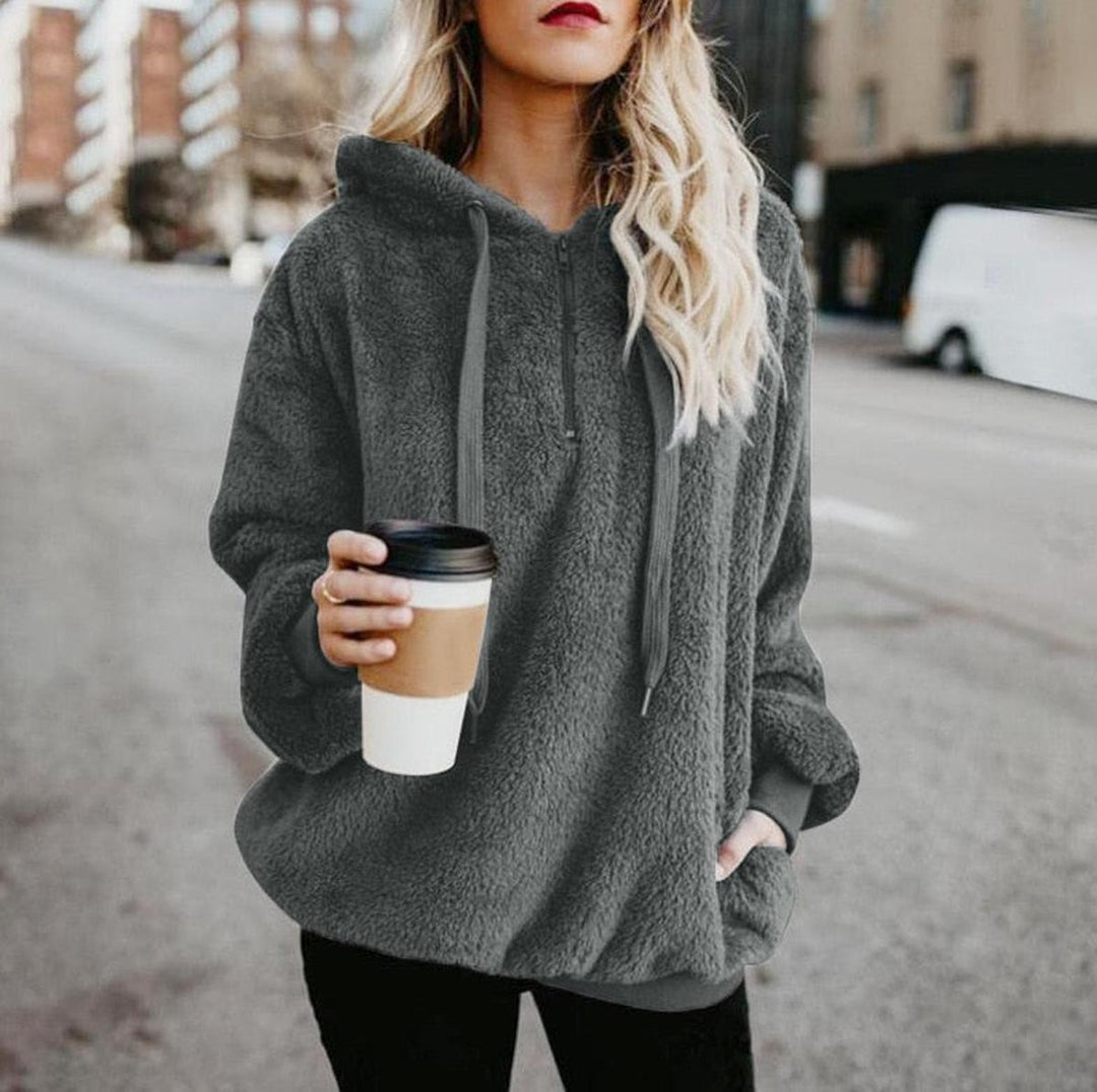 Regine Bluză de Damă Elegantă – Pulover Moale cu Croială Avantajoasă și Design Modern