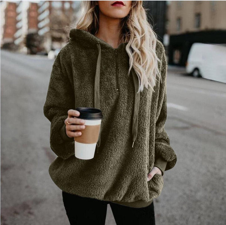 Regine Bluză de Damă Elegantă – Pulover Moale cu Croială Avantajoasă și Design Modern