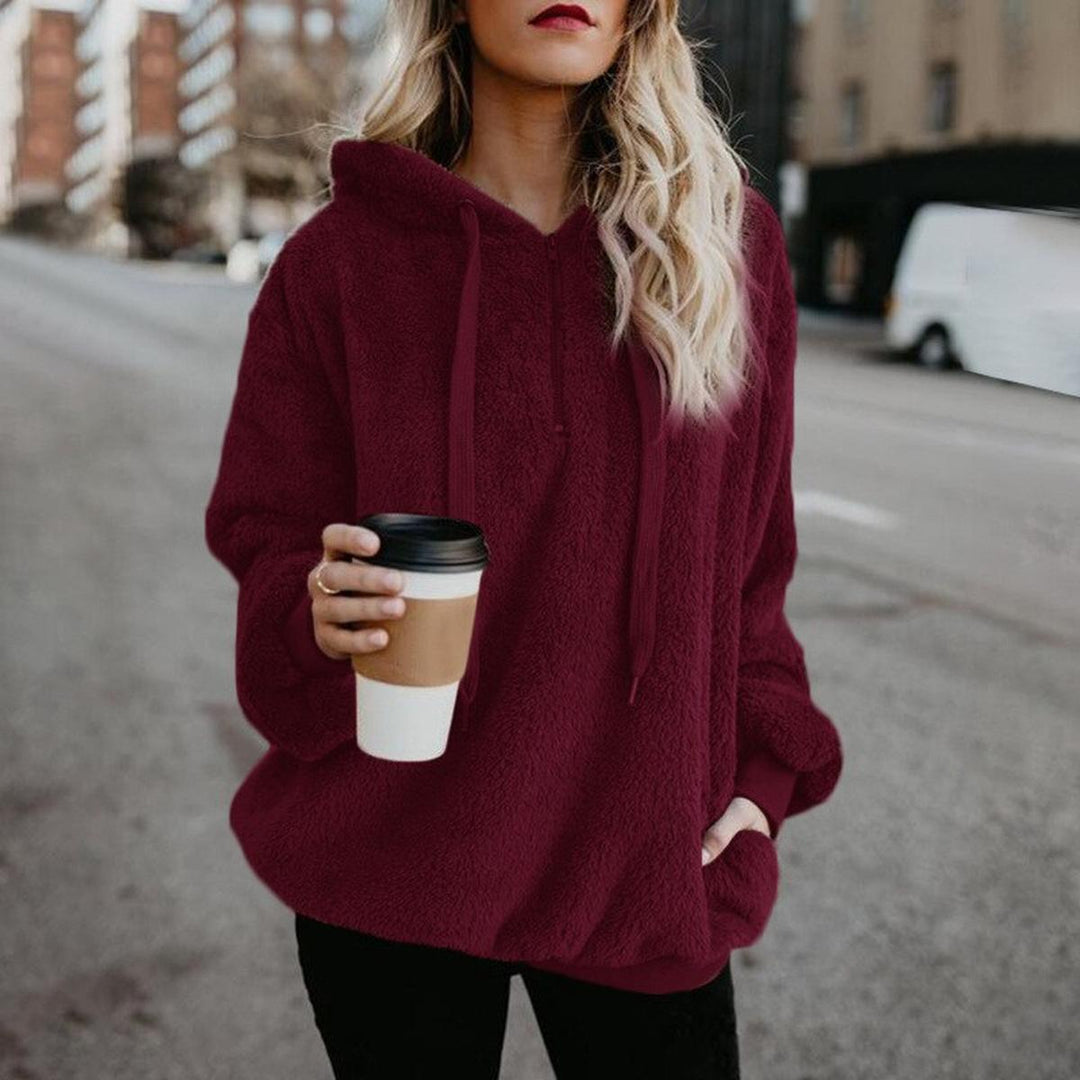 Regine Bluză de Damă Elegantă – Pulover Moale cu Croială Avantajoasă și Design Modern