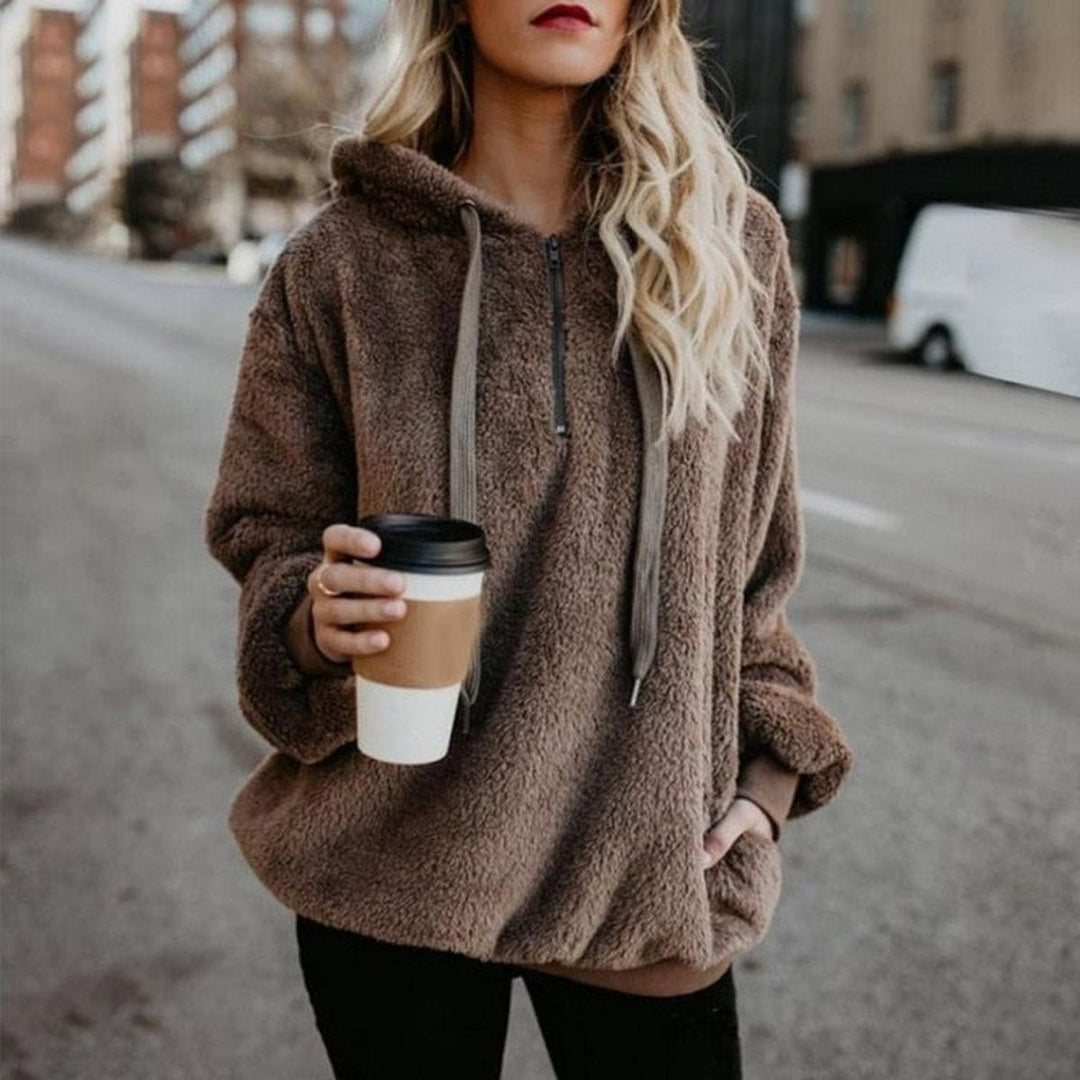 Regine Bluză de Damă Elegantă – Pulover Moale cu Croială Avantajoasă și Design Modern