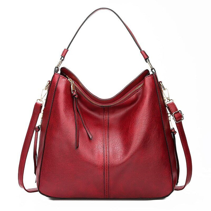 Többcélú bőr oldaltáska | Divatos